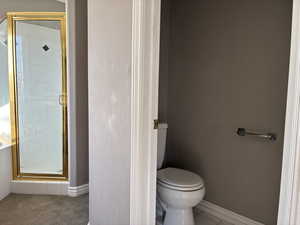 Ensuite Bathroom featuring a stall shower