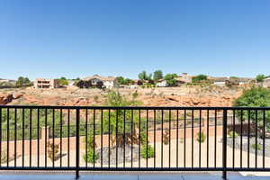 Balcony featuring a residential view