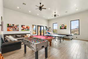 Rec room featuring ceiling fan, recessed lighting, and light wood finished floors