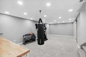 Workout area featuring carpet flooring, recessed lighting, and baseboards