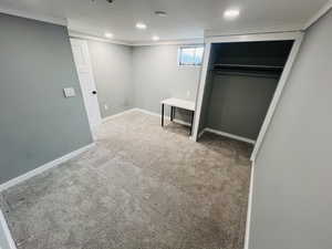 Basement with carpet flooring, recessed lighting, and baseboards