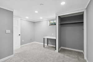Unfurnished bedroom with carpet floors, recessed lighting, and baseboards