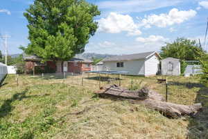 View of yard with a mountain view