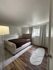 Bedroom featuring wood finished floors