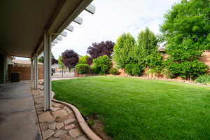 View of yard with central AC