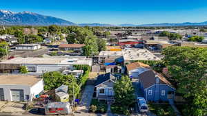 Aerial view of residential area with a mountainous background
