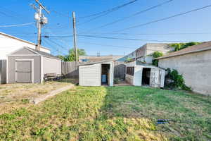 View of yard featuring a storage shed