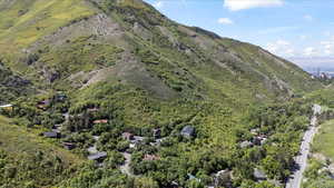 Aerial view of property's location with a mountain backdrop