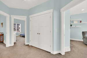 Upstairs spacious laundry area off owner's suite.