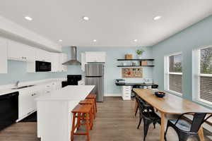 Kitchen featuring lots of natural light.
