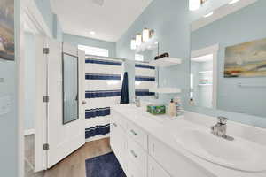 Owner's suite bathroom with double vanity.