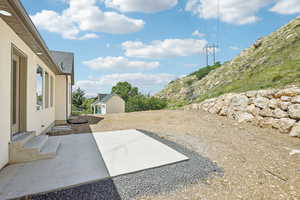 View of patio / terrace featuring an outbuilding