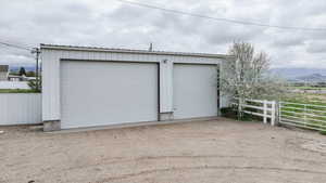 Detached garage with a mountain view