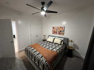 Bedroom featuring carpet flooring, baseboards, a closet, and ceiling fan
