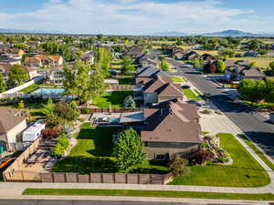 Aerial view of residential area with a mountainous background