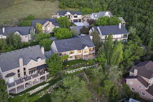 Aerial view of property's location with nearby suburban area