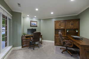 Home office featuring light carpet, baseboards, crown molding, and recessed lighting