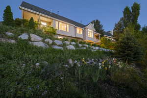 Rear view of property featuring stucco siding