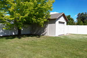 View of yard with shed