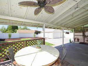 View of patio / terrace with an outbuilding and outdoor dining space