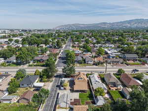 Aerial view of residential area featuring mountains