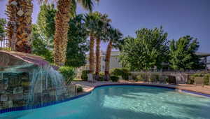 View of swimming pool with a patio