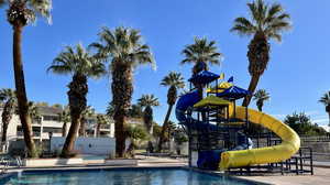 Community pool with a water slide