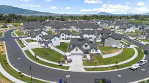 Aerial view of residential area with a mountain backdrop