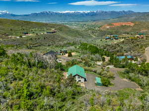 View of subject property featuring mountains