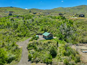 View of subject property featuring mountains