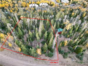 Aerial overview of property's location featuring property boundaries highlighted