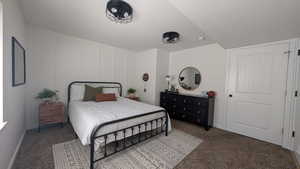 Bedroom with carpet and baseboards