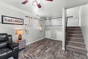 Living room with storage under entry