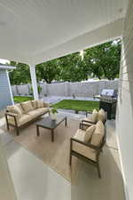 Staged back covered porch.  It's huge!