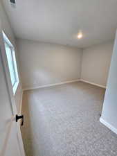 Basement bedroom #3 with large egress window