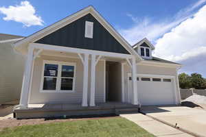 Welcoming Large East Facing Front Porch.  Homesite 204 at The Homestead