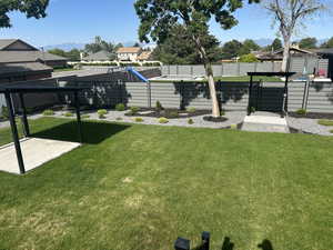 View of yard with a mountain view and a residential view