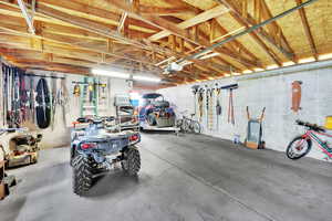Garage with a garage door opener and concrete block wall