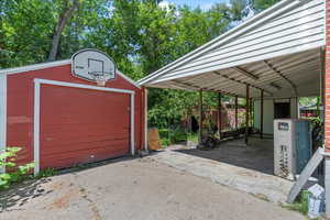Garage featuring driveway