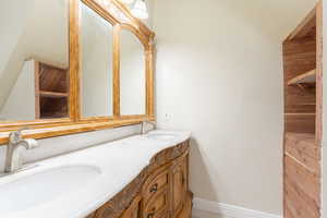 Full bathroom with double vanity