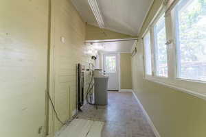 Washroom with brick patterned flooring