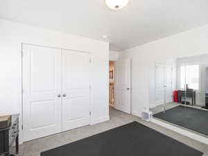 bedroom currently used as an exercise room