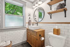 Bathroom added in 2019 - Vanity was custom made from an old bar cart.