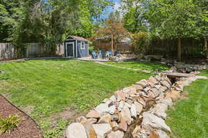 Natural springs run through the property. Sellers added an extensive french drain system in the backyard in 2021.