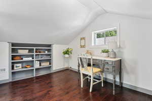 Second bedroom upstairs featuring built in shelves. The sellers previously used this room as a guest room with a queen bed, and it was also used as a nursery at one point.