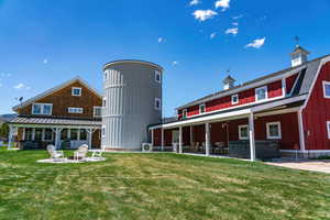 View of building exterior with a fire pit