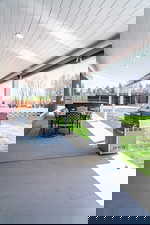 View of patio / terrace featuring area for grilling and outdoor dining area