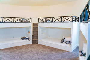 Unfurnished bedroom featuring carpet flooring