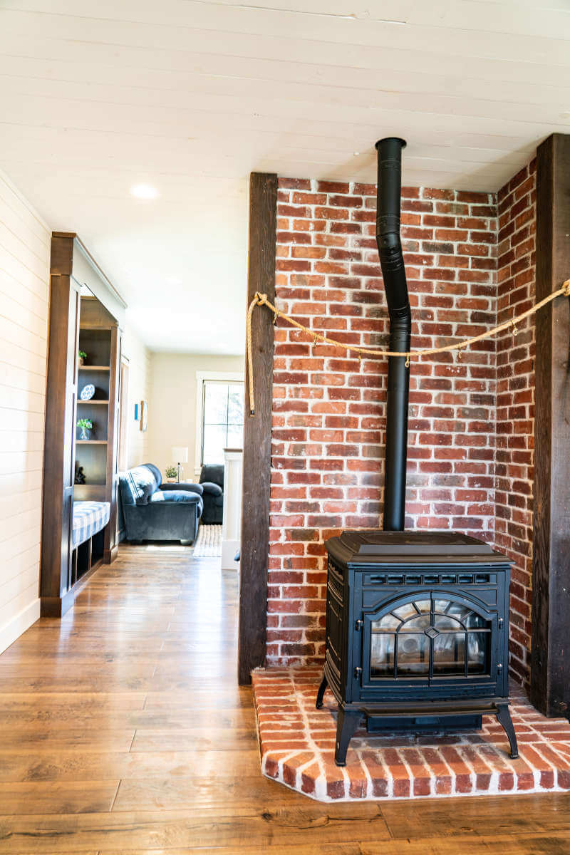 Detailed view of a wood stove and wood finished floors