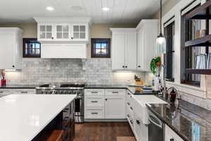 Kitchen featuring appliances with stainless steel finishes, white cabinets, recessed lighting, and wooden ceiling